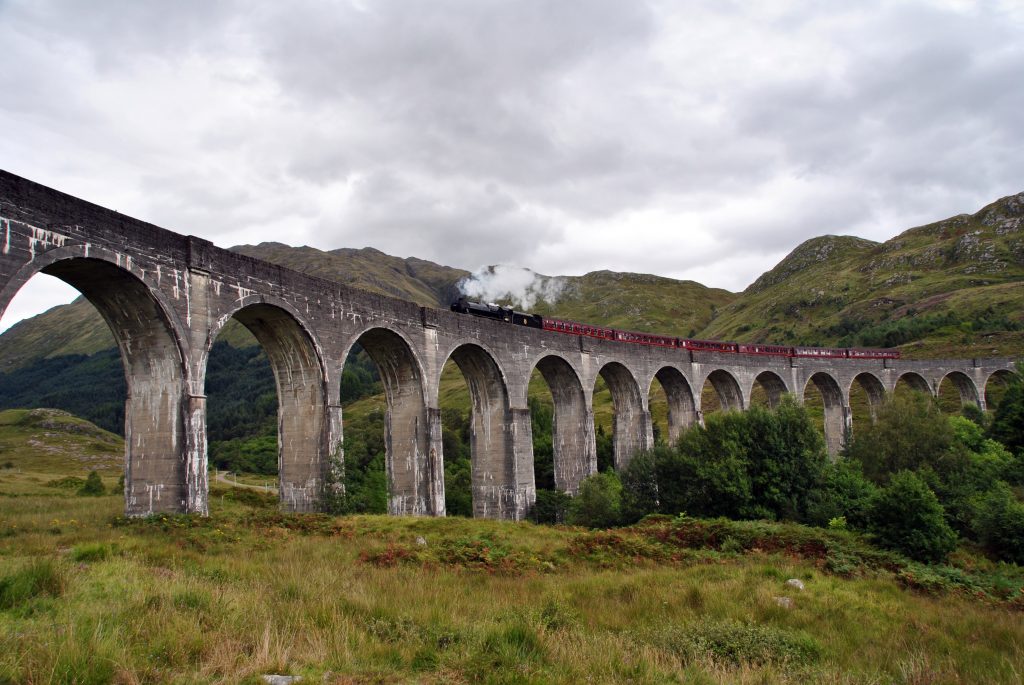 A picture of the train in HP going over the viaduct.