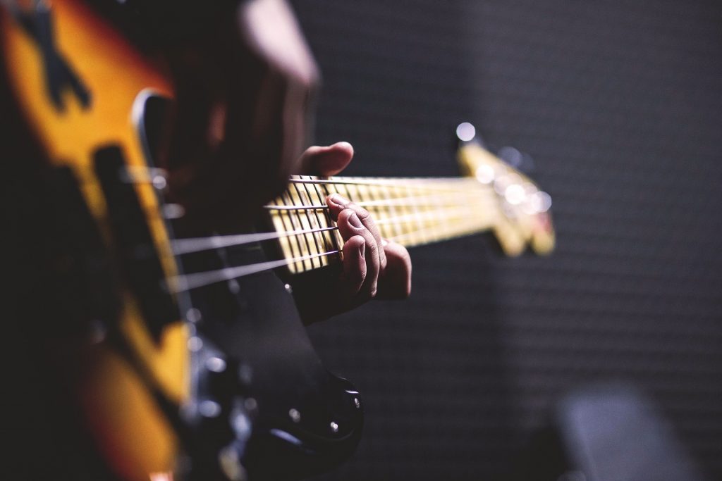 A close up of a bass guitar