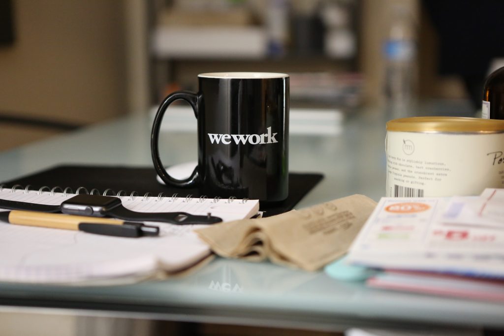 A picture of a mug of coffee on a desk