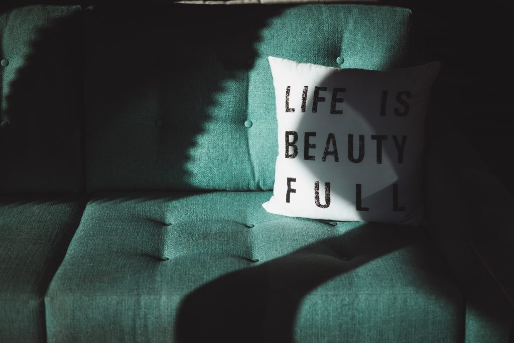 A picture of a cushion with Life Is Beauty Full on it