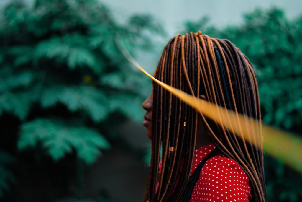 A picture of a woman with dreadlocks